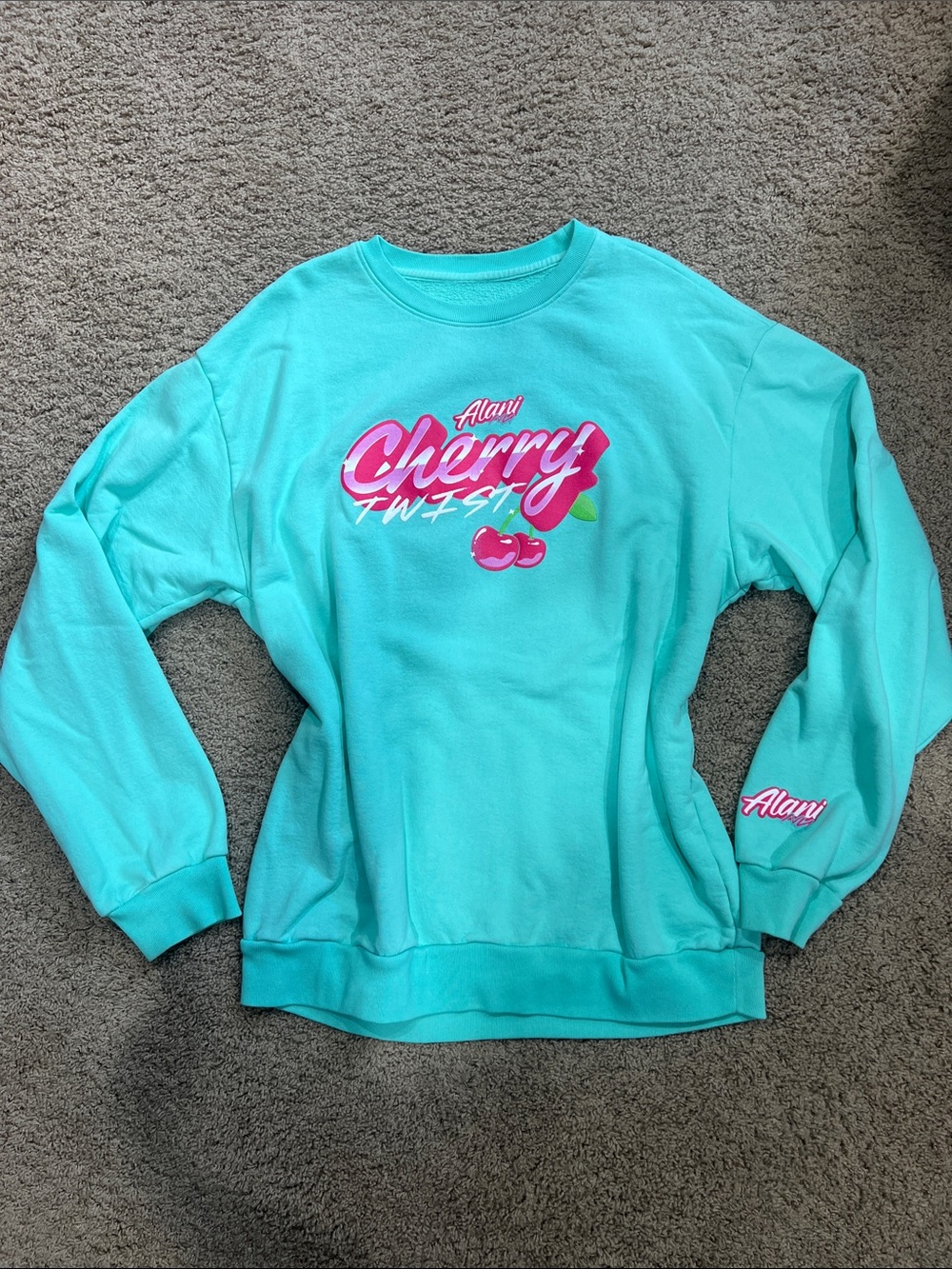 Alani Nu Aqua Crewneck Sweater with Pink Cherry Logo